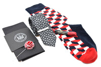 Kings Stay Kings pre-styled box featuring a pocket square, lapel pin, tie, tie bar, shoe laces, and socks.