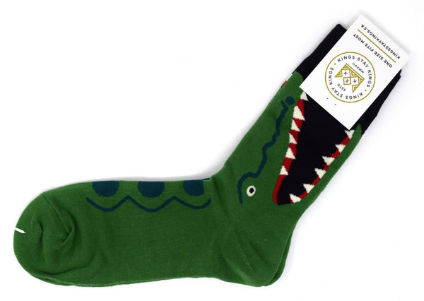 green and black socks with a large alligator.