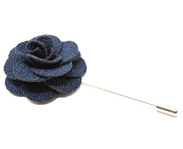 Large navy flower lapel pin for a suit.
