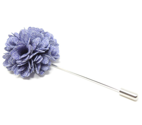 Purple flower lapel pin for a suit.