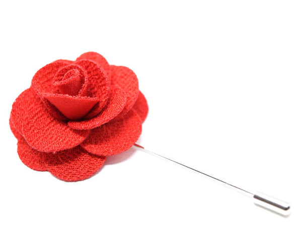 Large red flower lapel pin.