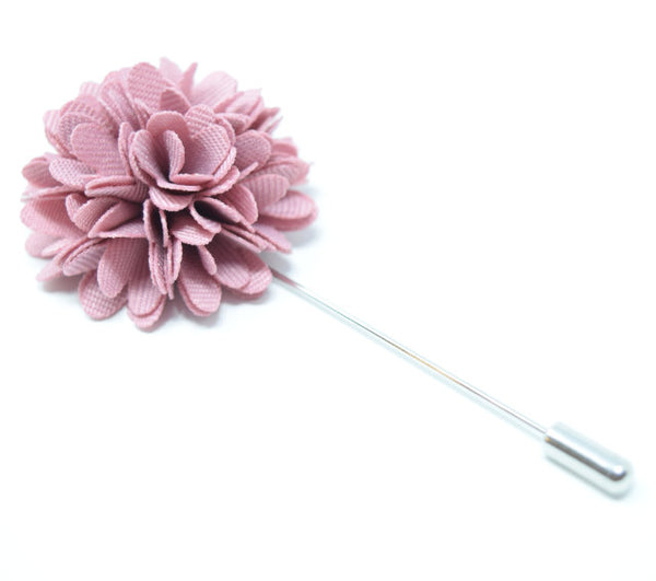 Rose flower lapel pin to be worn on a suit.