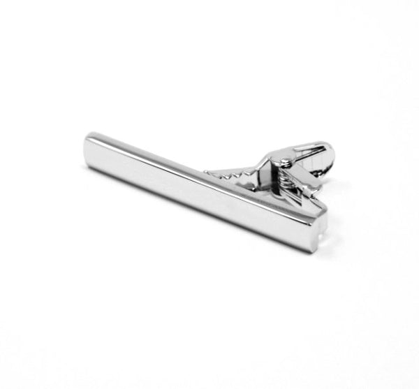 Polished silver tie clip.