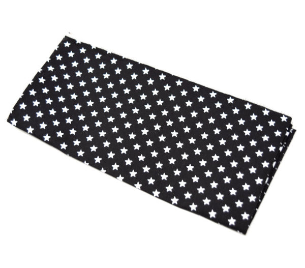 Sunset Blvd. is a black pocket square with small white stars.