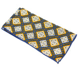 Rich Mahogany is a navy pocket square with gold and white diamond shaped accents.