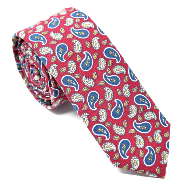 Red tie with navy paisley.