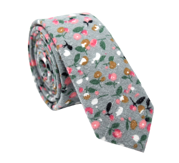 Grey tie with small floral pattern featuring pink, black, white, brown, and green colours. This is a 2.5" (5cm) skinny tie 